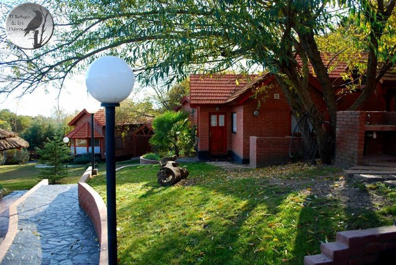Cabanas El Refugio De Los Pajaros Merlo Exterior foto