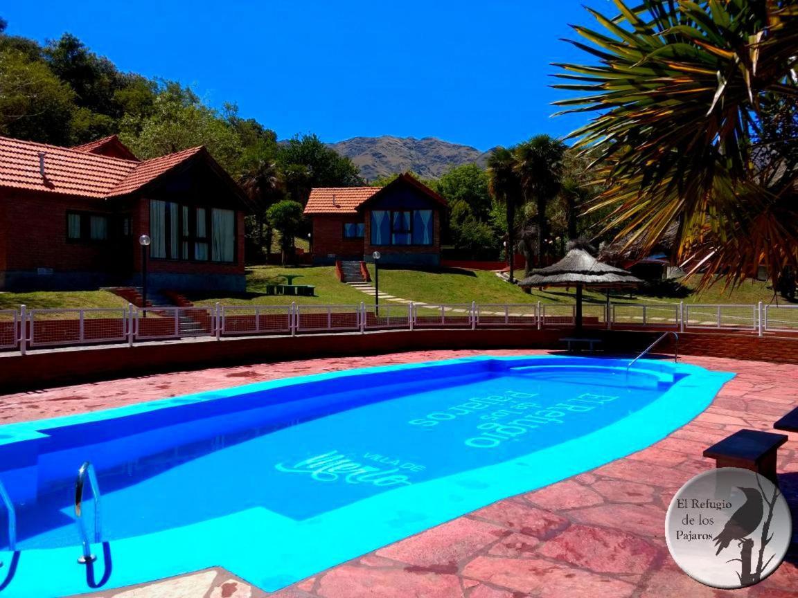 Cabanas El Refugio De Los Pajaros Merlo Exterior foto
