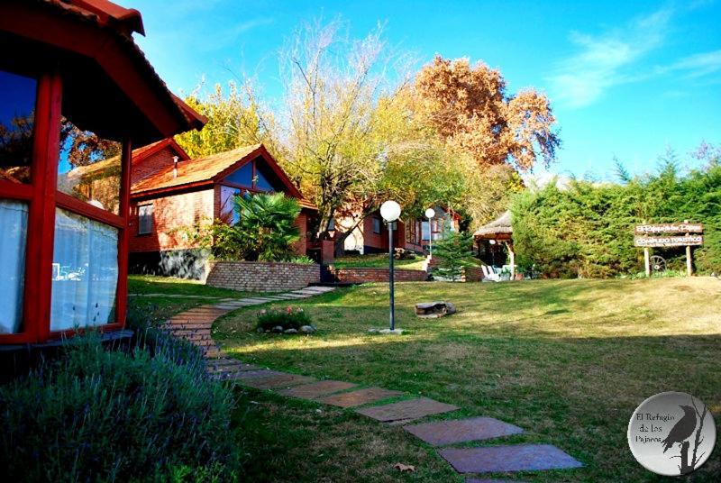 Cabanas El Refugio De Los Pajaros Merlo Exterior foto
