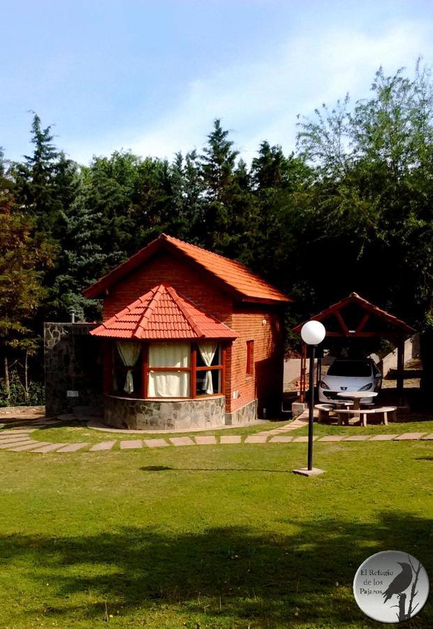 Cabanas El Refugio De Los Pajaros Merlo Exterior foto